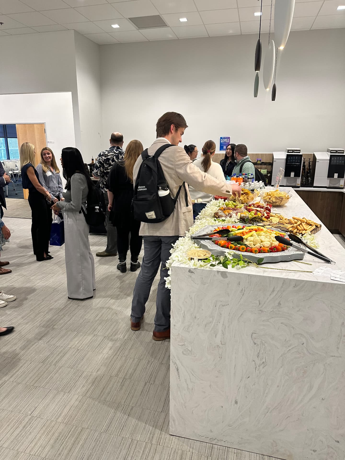 Corporate event guests gathering at a grazing and hospitality station managed by Raven's Reserve